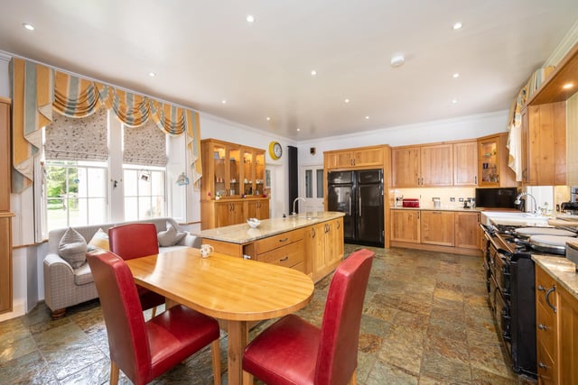 The contemporary kitchen with an Aga range oven.