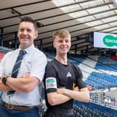 Specsavers’ Martin O’Neill and young referee Jasiu Janowiec.