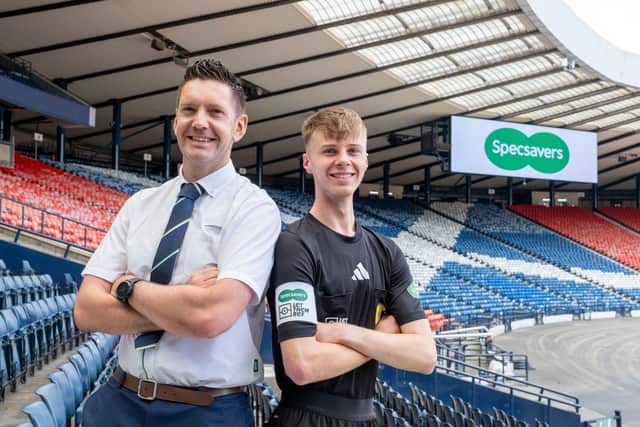 Specsavers’ Martin O’Neill and young referee Jasiu Janowiec.