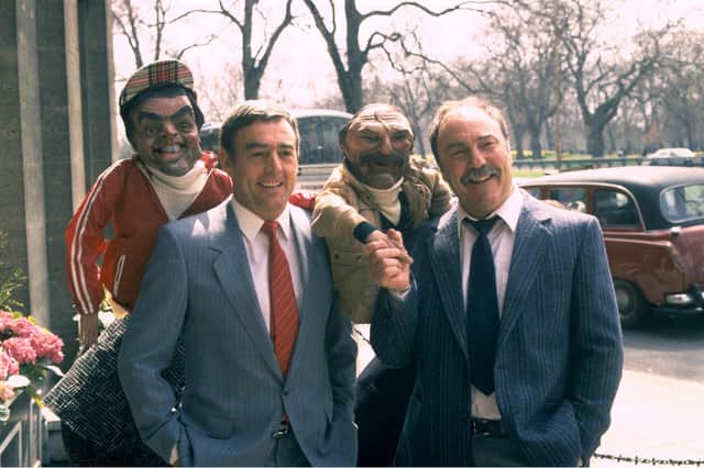 Ian St John, left, and Jimmy Greaves meet their own puppets from satirical show Spitting Image in 1989 (Picture: ITV/Shutterstock)