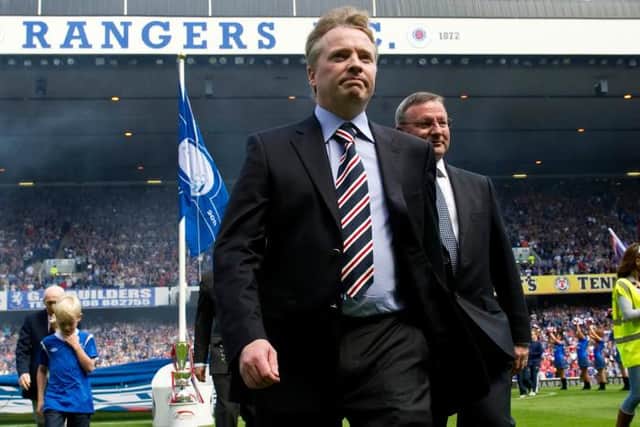 Craig Whyte on the pitch at Ibrox on July 23, 2011 after taking part in the unfurling of the league title-winning flag before a match against Hearts. (Photo by Craig Williamson/SNS Group).