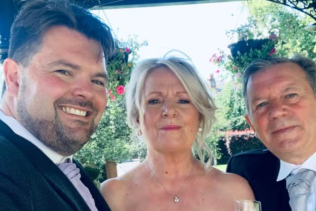 Rev Jonathan Fleming, with Margaret and Brian Carberry.