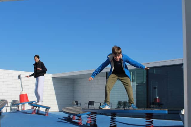 Playing on the roof of Lego House, Billund. Pic: PA Photo/Josie Clarke