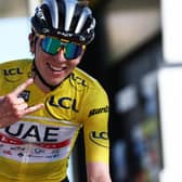 Team Emirates' Slovenian rider Tadej Pogacar celebrates as he crosses the finish line of the 8th and final stage of the 81st Paris - Nice cycling race.