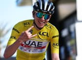 Team Emirates' Slovenian rider Tadej Pogacar celebrates as he crosses the finish line of the 8th and final stage of the 81st Paris - Nice cycling race.