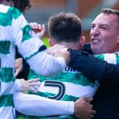 Celtic manager Brendan Rodgers celebrates Adam Idah's goal at Ibrox.