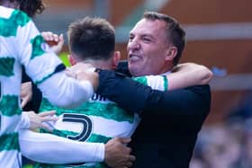 Celtic manager Brendan Rodgers celebrates Adam Idah's goal at Ibrox.
