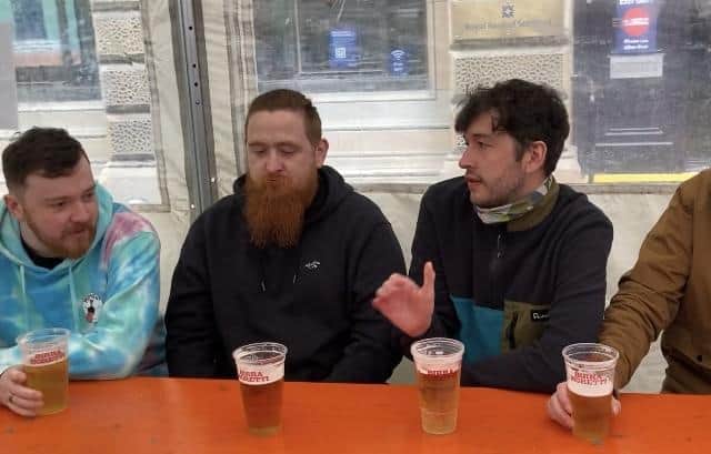 Friends enjoying pints at Bier Halle in Glasgow (Photo: John Devlin).