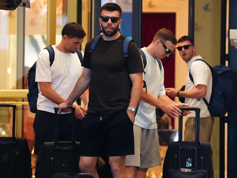 Scotland's Grant Hanley leaving the team hotel