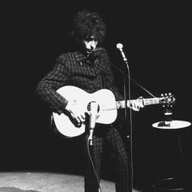 Bob Dylan performs on stage at the Olympia Theater in Paris May 25, 1966.