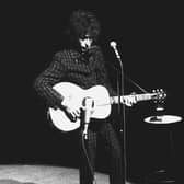 Bob Dylan performs on stage at the Olympia Theater in Paris May 25, 1966.