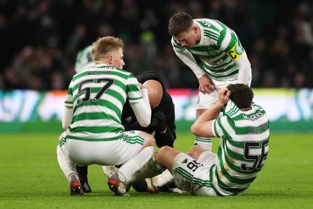Celtic's Anthony Ralston is forced off injured during a cinch Premiership match between Celtic and Heart of Midlothian at Celtic Park, on December 02, 2021, in Glasgow, Scotland. (Photo by Craig Williamson / SNS Group)