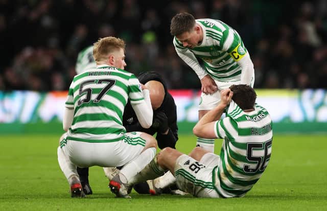 Celtic's Anthony Ralston is forced off injured during a cinch Premiership match between Celtic and Heart of Midlothian at Celtic Park, on December 02, 2021, in Glasgow, Scotland. (Photo by Craig Williamson / SNS Group)