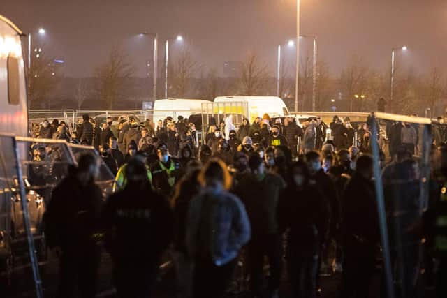 GLASGOW, SCOTLAND - NOVEMBER 29: There's a large police presence as Celtic fans gather outside Celtic Park after a Betfred Cup defeat to Ross County on November 29, 2020, in Glasgow, Scotland. (Photo by Alan Harvey / SNS Group)