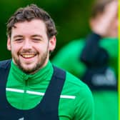 Drey Wright is all smiles during a Hibs training session at East Mains