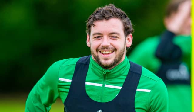 Drey Wright is all smiles during a Hibs training session at East Mains