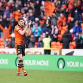 Dundee United's Ross Graham applauds the fans after the final whistle of the cinch Premiership match at Tannadice Park, Dundee. Picture date: Sunday February 20, 2022. PA Photo. See PA Story SOCCER Dundee Utd. (Jane Barlow/PA Wire)