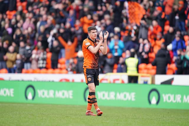 Dundee United's Ross Graham applauds the fans after the final whistle of the cinch Premiership match at Tannadice Park, Dundee. Picture date: Sunday February 20, 2022. PA Photo. See PA Story SOCCER Dundee Utd. (Jane Barlow/PA Wire)