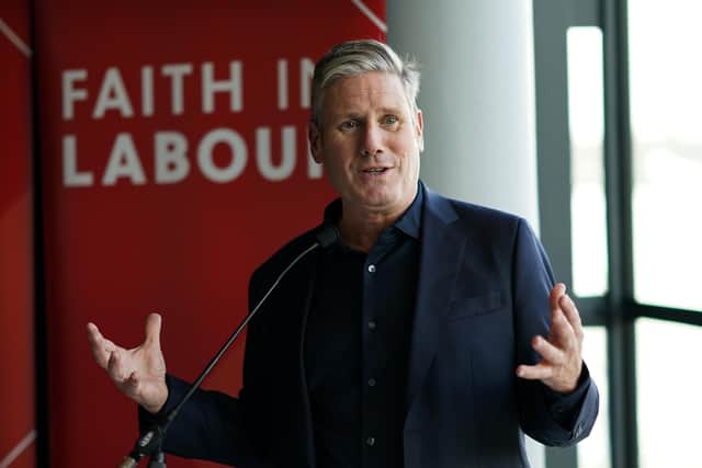 Keir Starmer recently said Labour would spend £15 billion a year, instead of £28bn, on green projects like insulating homes if elected (Picture: Ian Forsyth/Getty Images)