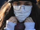 Face masks can sometimes make conversations more difficult to understand, says Bill Jamieson (Picture: Daniel Leal-Olivas/AFP via Getty Images)