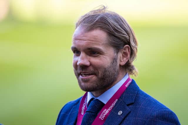 Hearts manager Robbie Neilson with his Championship medal.