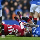 Rangers' Ryan Jack (R) is brought down by Nicky Clark in the challenge that resulted in the now overturned red card for the St Johnstone striker.  (Photo by Rob Casey / SNS Group)