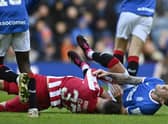 Rangers' Ryan Jack (R) is brought down by Nicky Clark in the challenge that resulted in the now overturned red card for the St Johnstone striker.  (Photo by Rob Casey / SNS Group)