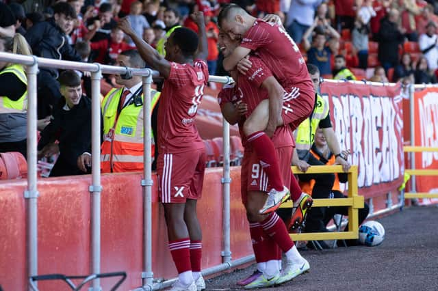 Bojan Miovski celebrates making it 3-0 to Aberdeen during the rout of Livingston.