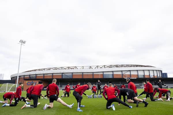 The Aberdeen players train at The City Stadium, in the shadows of Hampden, ahead of Saturday's semi-final against Hibs.