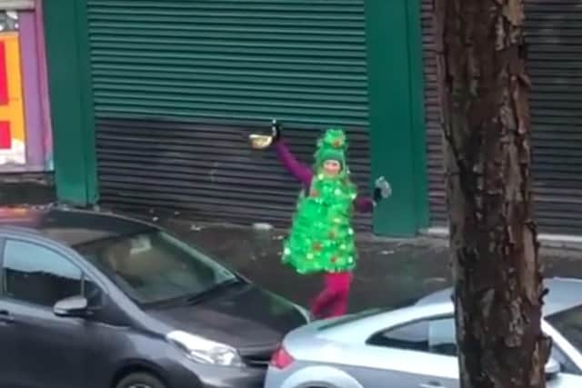 Taking to Twitter, Nicola Sturgeon shared a video of Kate Deeming dancing on Nithsdale Road, Pollokshields, dressed as a Christmas tree.