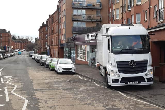 A lorry parked across a pavement in Crow Road in the Partick area of Glasgow in March (Picture: The Scotsman)