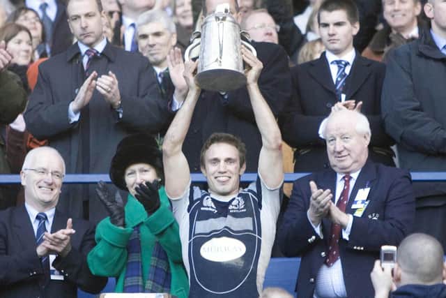 Scotland's Mike Blair lifts the Calcutta Cup after the win over England at Murrayfield in 2008. (Picture: Craig Watson/SNS)