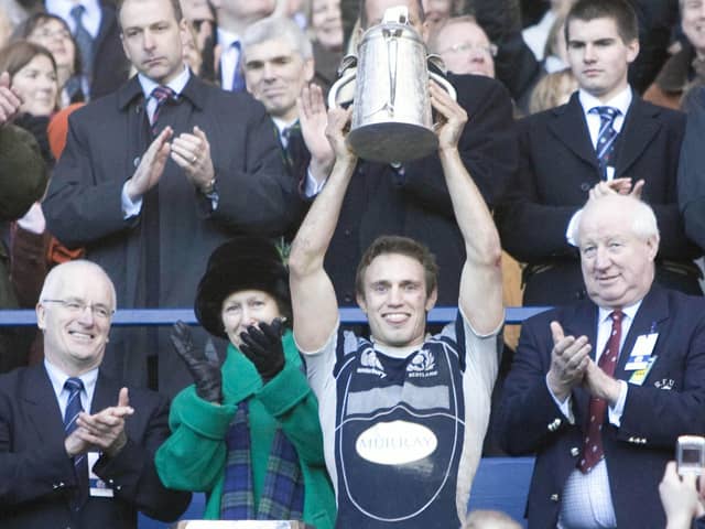 Scotland's Mike Blair lifts the Calcutta Cup after the win over England at Murrayfield in 2008.  (Picture: Craig Watson/SNS)