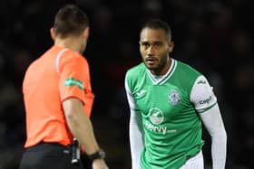 Referee Steven McLean speaks with Hibs defender Jordan Obita after his foul on St Mirren's Richard Taylor results in a penalty being awarded after a VAR check. (Photo by Ross MacDonald / SNS Group)