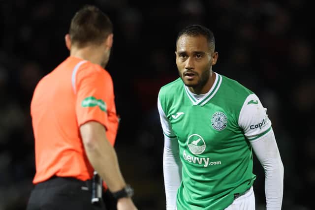 Referee Steven McLean speaks with Hibs defender Jordan Obita after his foul on St Mirren's Richard Taylor results in a penalty being awarded after a VAR check. (Photo by Ross MacDonald / SNS Group)