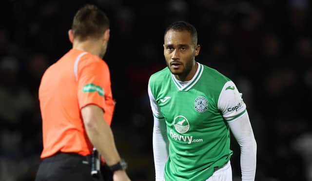 Referee Steven McLean speaks with Hibs defender Jordan Obita after his foul on St Mirren's Richard Taylor results in a penalty being awarded after a VAR check. (Photo by Ross MacDonald / SNS Group)