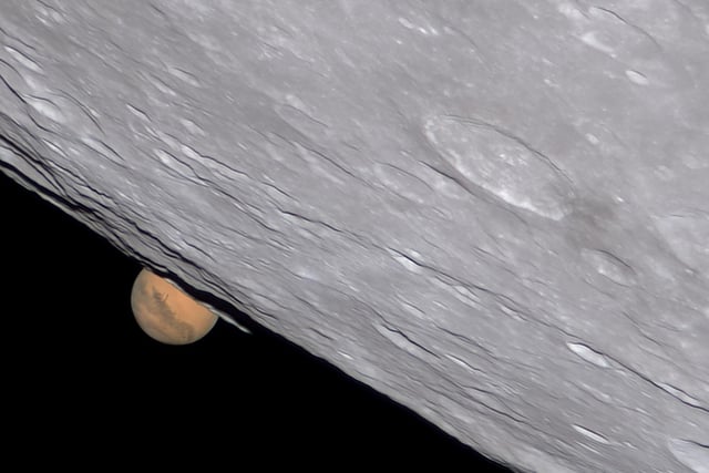 Winner
Mars-Set © Ethan Chappel 
An occultation of Mars that took place on 8 December 2022. During the occultation, the Moon passes in front of the planet Mars, allowing the astrophotographer to capture both objects together. The image shows Mars behind the Moon’s southern side in impressive detail. 
‘The occultation of Mars by the Moon was one of the last and greatest celestial events of 2022. It was also one of the most challenging to image. To capture the level of detail on Mars that you see here takes a huge amount of skill and practice. Combined with a crisp, clear, perfectly processed lunar limb, the result is like taking a gigantic telephoto lens into lunar orbit itself! This image is a technical marvel and a real treat to look at – two factors that make it a worthy winner in this category.’ - Steve Marsh
Taken with a Celestron EdgeHD 14 telescope, iOptron CEM70 mount, Astro-Physics BARADV lens, ZWO ASI462MC camera, 7,120 mm f/20, multiple 15-millisecond exposures

Location: Cibolo, Texas, USA