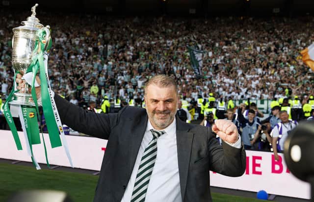 Ange Postecoglou with the Scottish Cup trophy which completed a domestic treble in his second and final season with Celtic. (Photo by Mark Scates / SNS Group)