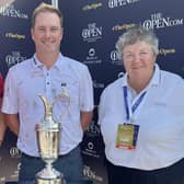 Marc Warren is flanked by Open Championship committee members Gavin Lawrie and Ada O'Sullivan after securing his spot in the Claret Jug event at Royal Liverpool. Picture: The R&A