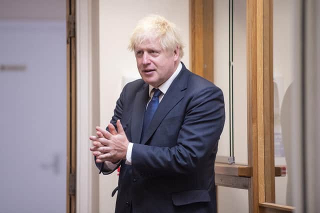Boris Johnson, seen sanitising his hands at a primary school in London, seems to be copying Donald Trump's political strategies, says Kenny MacAskill (Picture: Lucy Young/Evening Standard/PA Wire)