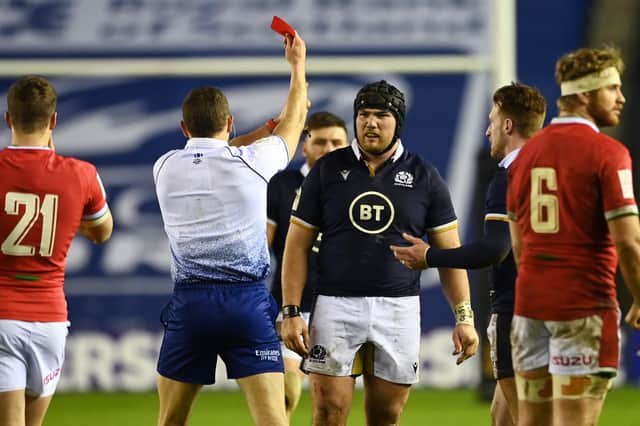 Scotland's Zander Fagerson is shown a red card against Wales by referee Matthew Carley. Picture: SNS