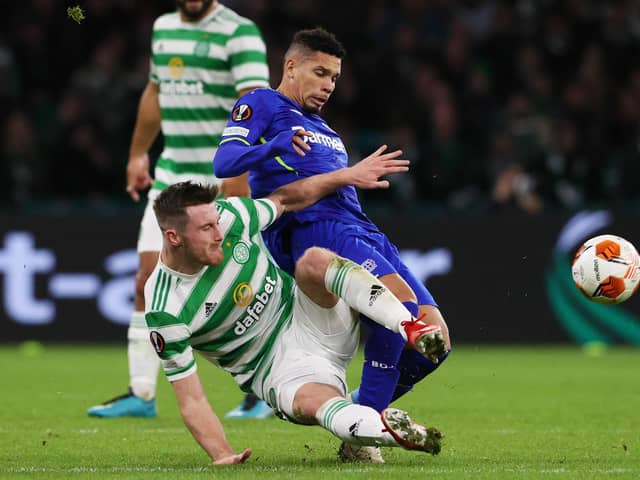 Celtic's Anthony Ralston tackles  Bayer Leverkusen's Paulinho (right) is tackled by Anthony Ralston in the sides' last meeting, the 4-0 win for the Germans in September. Ange Postecoglou's men have found their best form of the season ahead of the pair locking horns again in Germany tomorrow. (Photo by Alan Harvey / SNS Group)