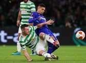 Celtic's Anthony Ralston tackles  Bayer Leverkusen's Paulinho (right) is tackled by Anthony Ralston in the sides' last meeting, the 4-0 win for the Germans in September. Ange Postecoglou's men have found their best form of the season ahead of the pair locking horns again in Germany tomorrow. (Photo by Alan Harvey / SNS Group)