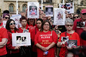 Infected blood campaigners in Parliament Square in London ahead of the publication of the final report into the scandal. Photo: Aaron Chown/PA Wire