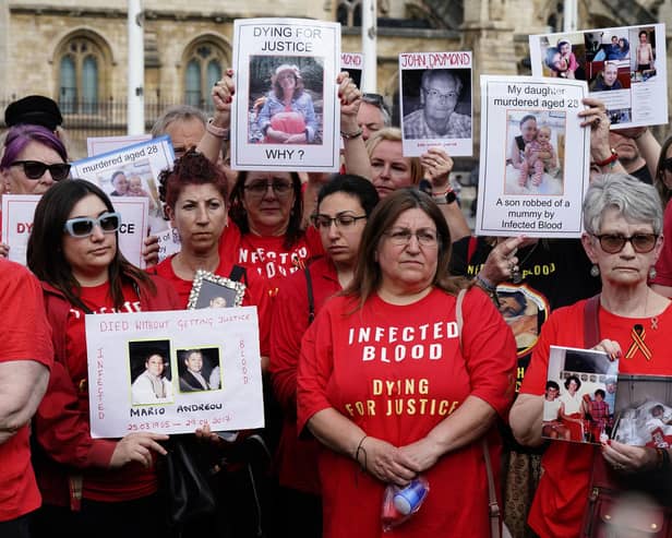 Infected blood campaigners in Parliament Square in London ahead of the publication of the final report into the scandal. Photo: Aaron Chown/PA Wire