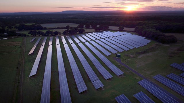 Solar panels in a field as SNP ministers and the Scottish Greens are being urged to set a 'stretching but achievable' target to massively increase Scotland's capacity for solar power. Picture: Steve Parsons/PA Wire