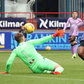 Joe Aribo scores the all-important goal for Rangers against Dundee.
