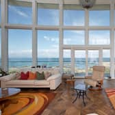 “The curved shape of the house was a starting point, in order to fully take in the view over the sea and the coastlines on either side”