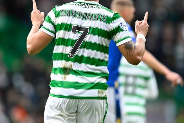 Celtic's Giorgos Giakoumakis points to the skies after pointing the way for Celtic to rack up a fourth straight win with his first goal for the club in the success over St Johnstone at Celtic Park. (Photo by Rob Casey / SNS Group)