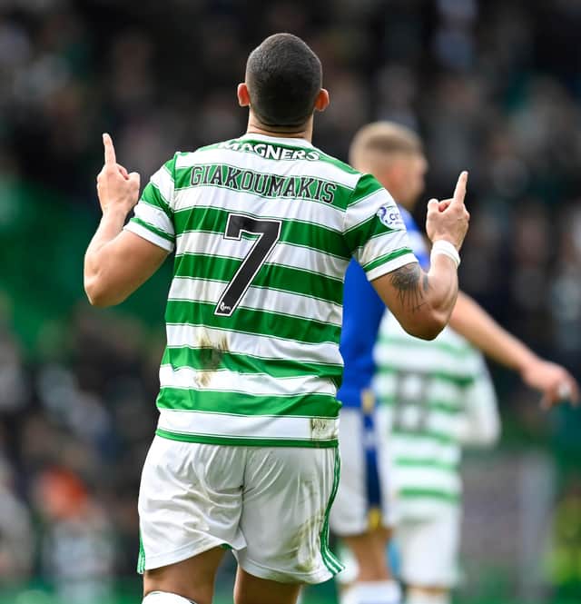Celtic's Giorgos Giakoumakis points to the skies after pointing the way for Celtic to rack up a fourth straight win with his first goal for the club in the success over St Johnstone at Celtic Park. (Photo by Rob Casey / SNS Group)